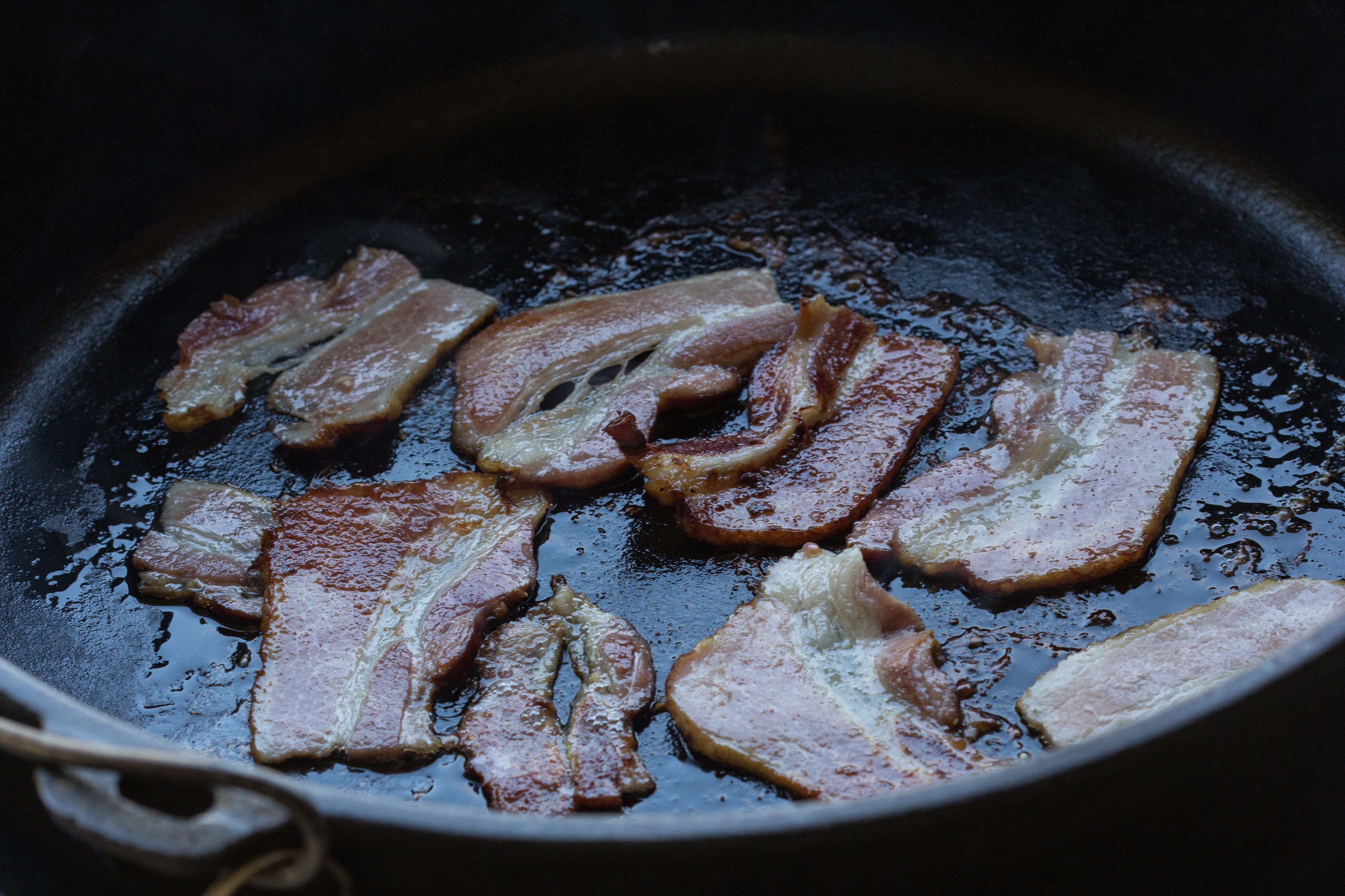 Frying Bacon in camp Dutch oven Again